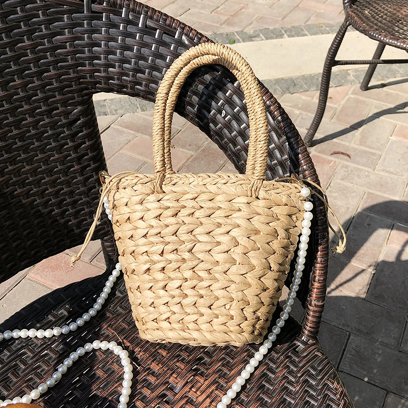 Small Bucket Straw Shoulder Bags Summer Beach Top-handle Handbags Ladies Pearl Chain Straw Crossbody Bag Weave Messenger Bag Sac
Small Bucket Straw Shoulder Bags Summer Beach Top-handle Handbags Ladies Pearl Chain Straw Crossbody Bag Weave Messenger Bag Sac