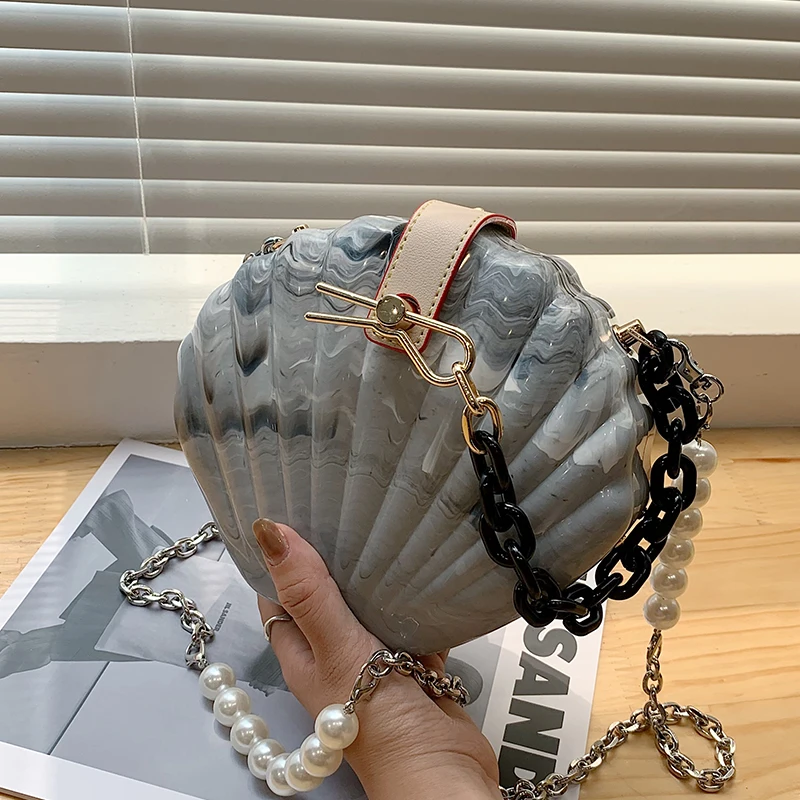 Hard Box Small Totes With Pearl Handle 2021 Summer New Quality Acrylic Women's Designer Handbag Chain Shoulder Messenger Bag
Hard Box Small Totes With Pearl Handle 2021 Summer New Quality Acrylic Women's Designer Handbag Chain Shoulder Messenger Bag