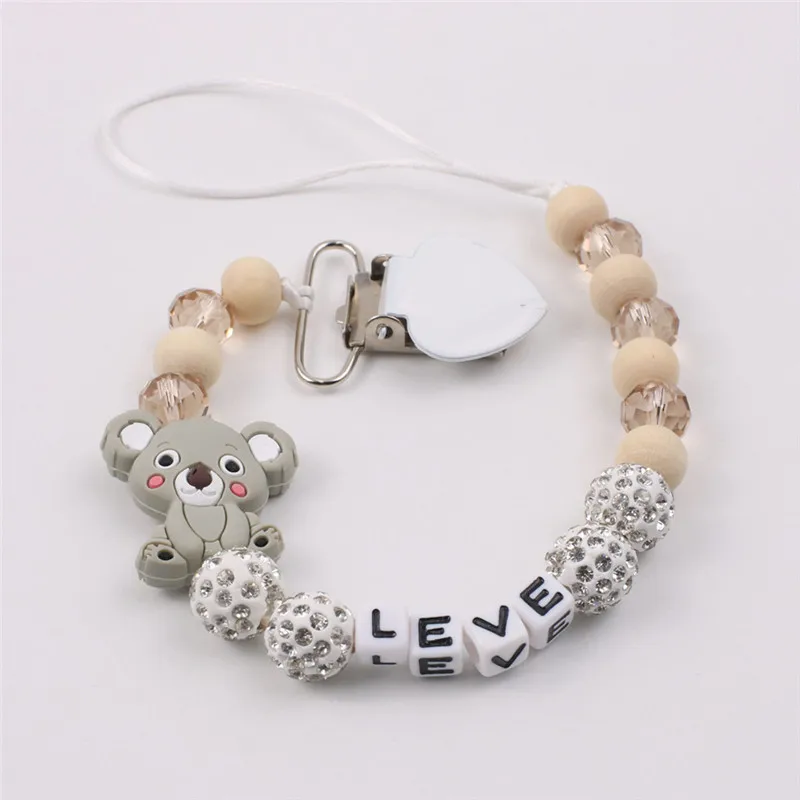 Baby Teethers Silicone Personalised Name Baby Pacifier Clips Crochet Beads Silicone Crown Pacifier Chain Holder Baby Shower Toys
Baby Teethers Silicone Personalised Name Baby Pacifier Clips Crochet Beads Silicone Crown Pacifier Chain Holder Baby Shower Toys