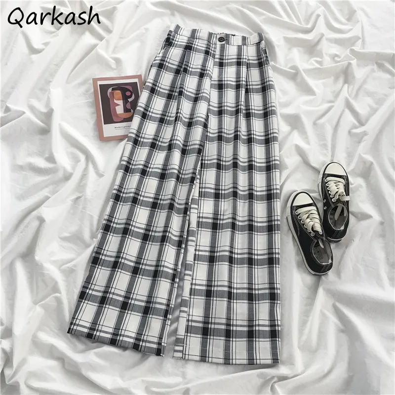 Брюки женские повседневные клетчатые длинные, свободные широкие брюки с эластичной высокой талией, универсальные студенческие винтажные в... 
Брюки женские повседневные клетчатые длинные, свободные широкие брюки с эластичной высокой талией, универсальные студенческие винтажные в...