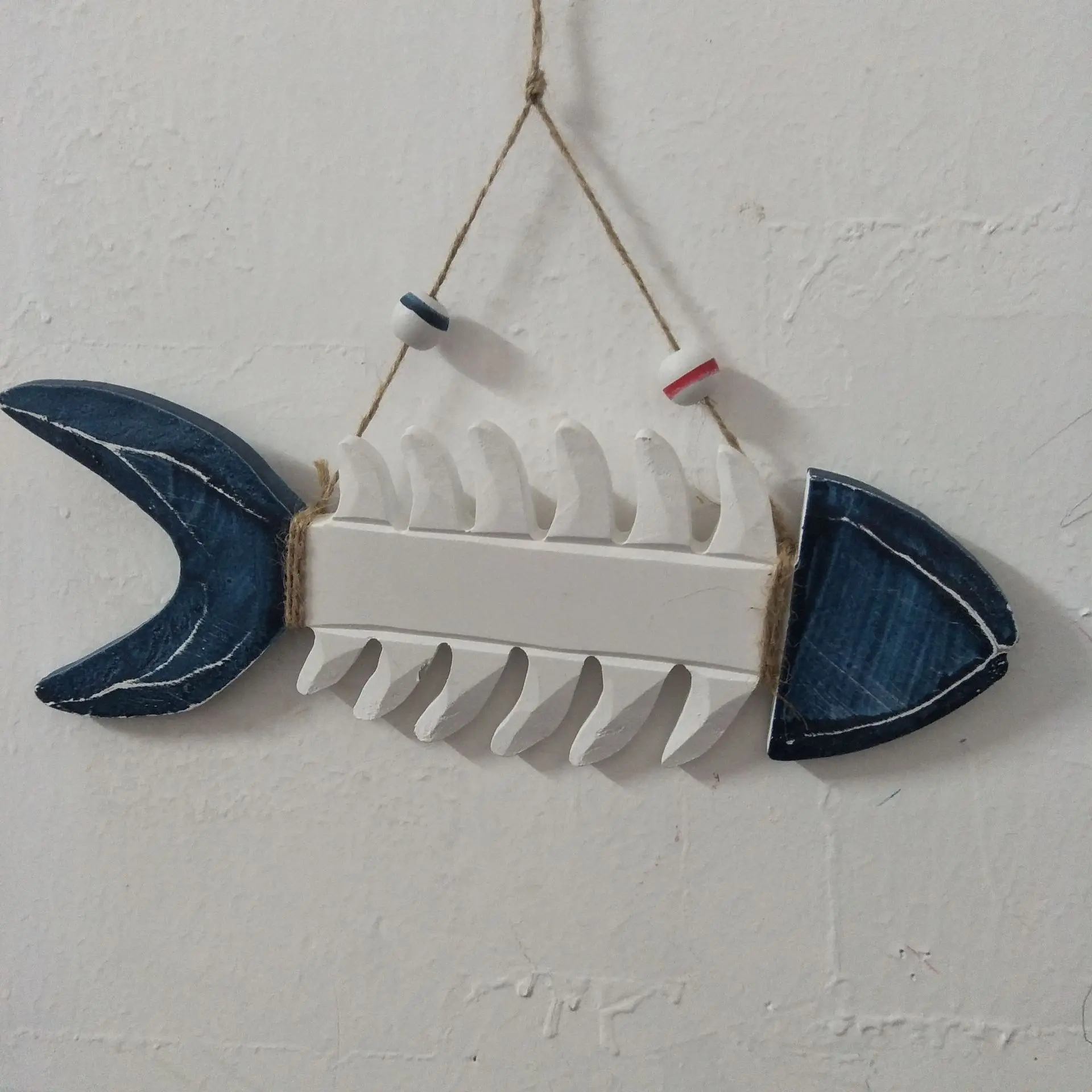 Mediterranean style pendant, wooden fish bone welcome card, old craftsmanship, creative home decoration, background wall partner
Mediterranean style pendant, wooden fish bone welcome card, old craftsmanship, creative home decoration, background wall partner
