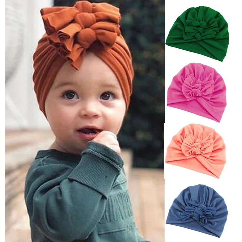Autumn and winter children's hats, pullovers, soft knitted fabric folds 3 bows, Indian hats baby hats 10pcs a set free shipping 
Autumn and winter children's hats, pullovers, soft knitted fabric folds 3 bows, Indian hats baby hats 10pcs a set free shipping