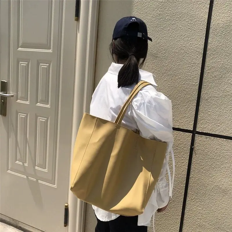 Shopping Bags Women PU Leather Tote Large Capacity Solid Office Ladies Korean Elegant Waterproof Shopper Bag All-match Leisure 
Shopping Bags Women PU Leather Tote Large Capacity Solid Office Ladies Korean Elegant Waterproof Shopper Bag All-match Leisure