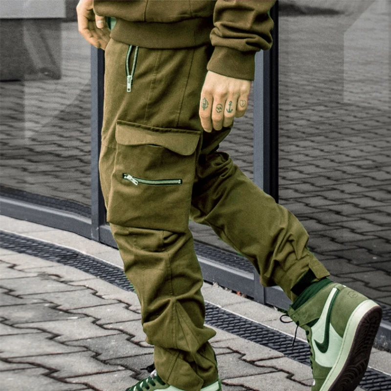 Harajuku Zipper Pockets Velcro Cargo Pants Men Casual Loose Solid Jogger Trousers 2021 Spring Summer Mens Fashion Streetwear 3XL
Harajuku Zipper Pockets Velcro Cargo Pants Men Casual Loose Solid Jogger Trousers 2021 Spring Summer Mens Fashion Streetwear 3XL