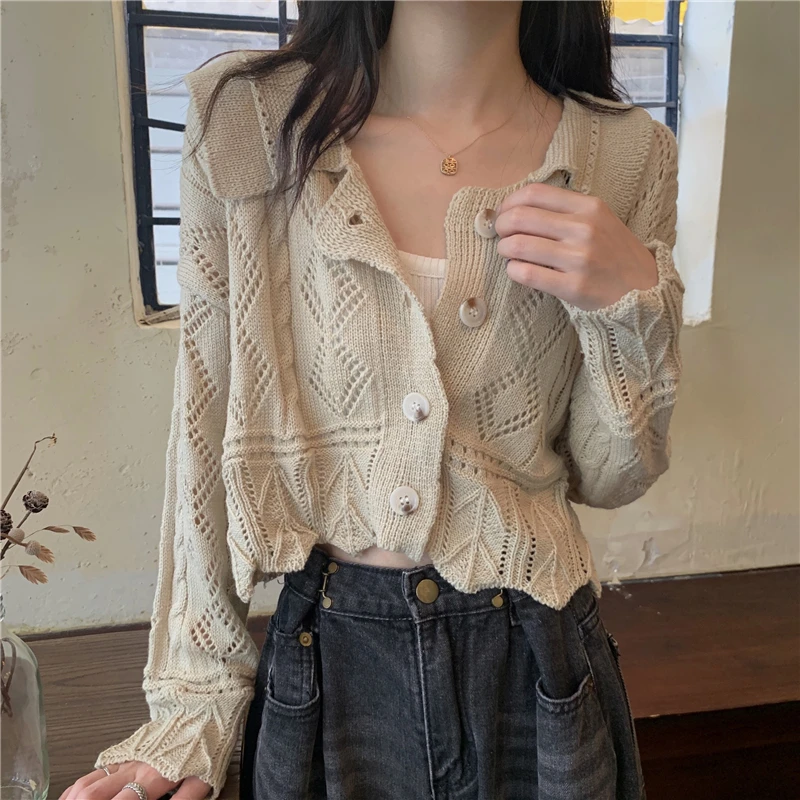 Autumn new fashion loose lapel hollow short knit sweater sweater long sleeve top women jacket
Autumn new fashion loose lapel hollow short knit sweater sweater long sleeve top women jacket
