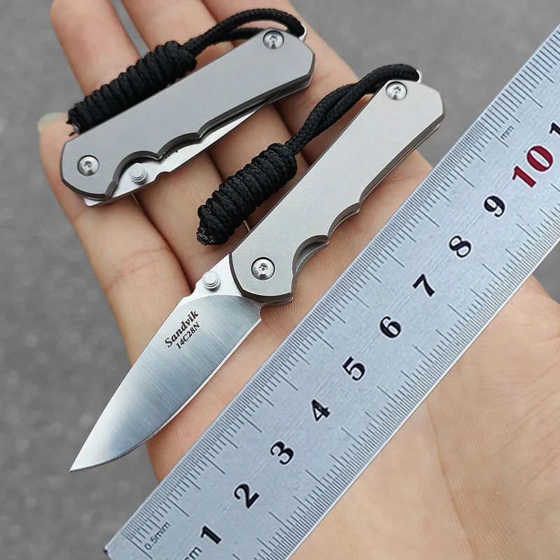 Titanium folding knife 12C28N steel high hardness tactical outdoor survival camping EDC tool knife
Titanium folding knife 12C28N steel high hardness tactical outdoor survival camping EDC tool knife