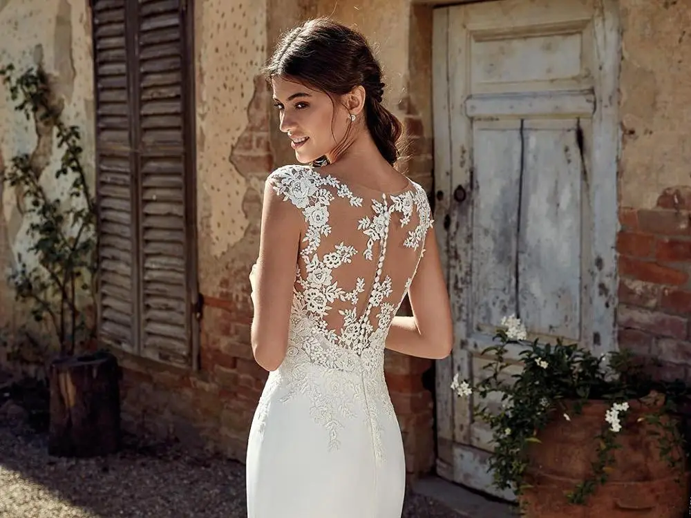 Booma Cap Sleeve Lace Appliqued Wedding Dresses Mermaid for Women Sleeveless Back Illusion Beach Bridal Gowns Plus Size
Booma Cap Sleeve Lace Appliqued Wedding Dresses Mermaid for Women Sleeveless Back Illusion Beach Bridal Gowns Plus Size