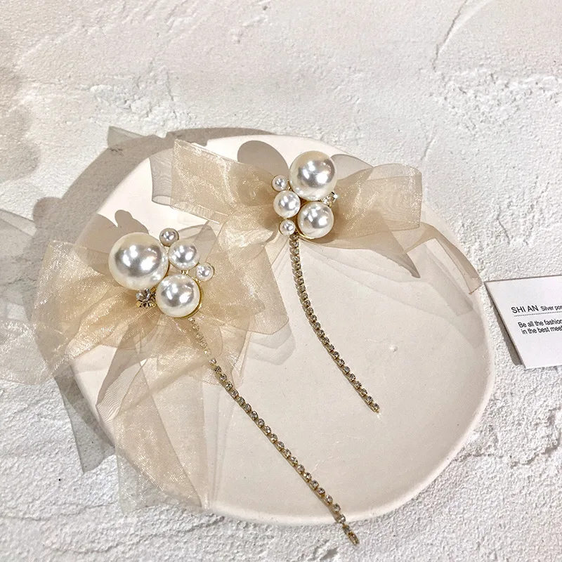 Elegant Perspective Yarn Bowknot Earrings for Women Oversize Imitation Pearl Tie Bow Dangle Earrings Vintage Jewelry
Elegant Perspective Yarn Bowknot Earrings for Women Oversize Imitation Pearl Tie Bow Dangle Earrings Vintage Jewelry