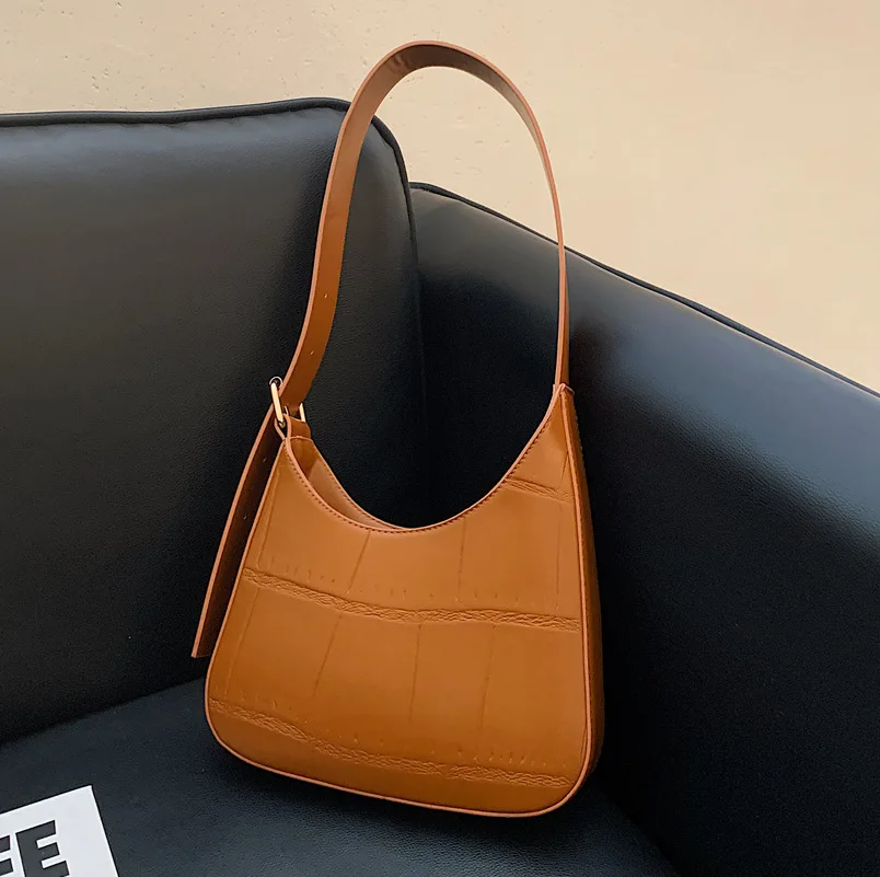 European and American Niche Casual Bag Women2021 New Fashion Ladies High-end Western Style Stone Texture One-shoulder Armpit Bag
European and American Niche Casual Bag Women2021 New Fashion Ladies High-end Western Style Stone Texture One-shoulder Armpit Bag