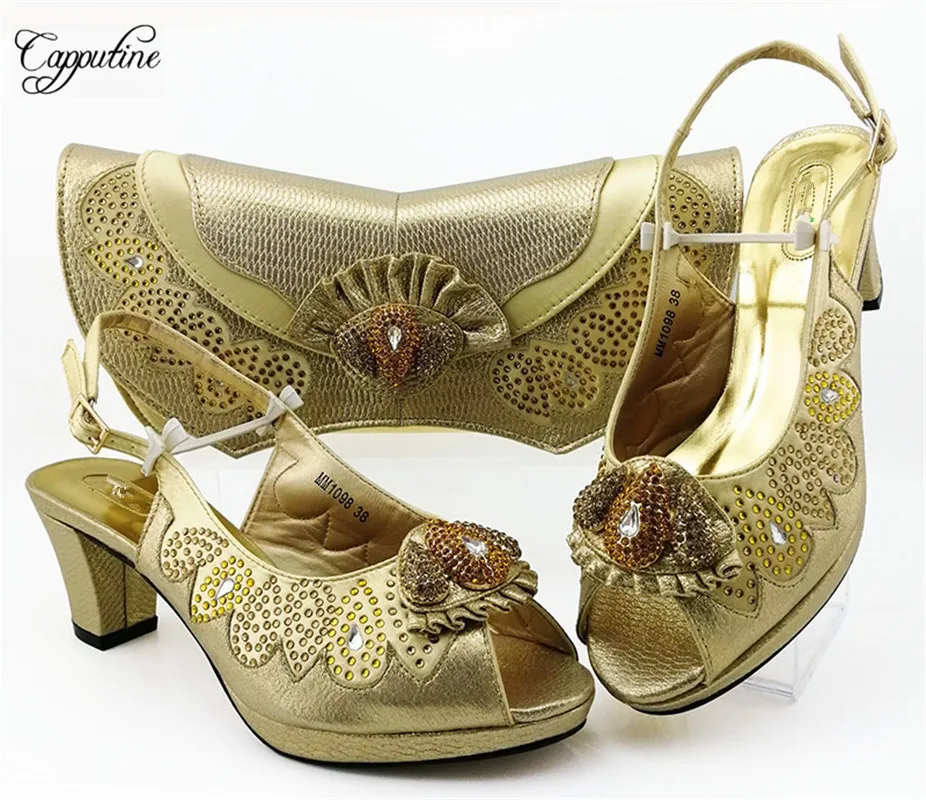 New arrival party set gold high heel shoes and bag set with rhinestones for lady MM1098, heel height 6.5cm
New arrival party set gold high heel shoes and bag set with rhinestones for lady MM1098, heel height 6.5cm