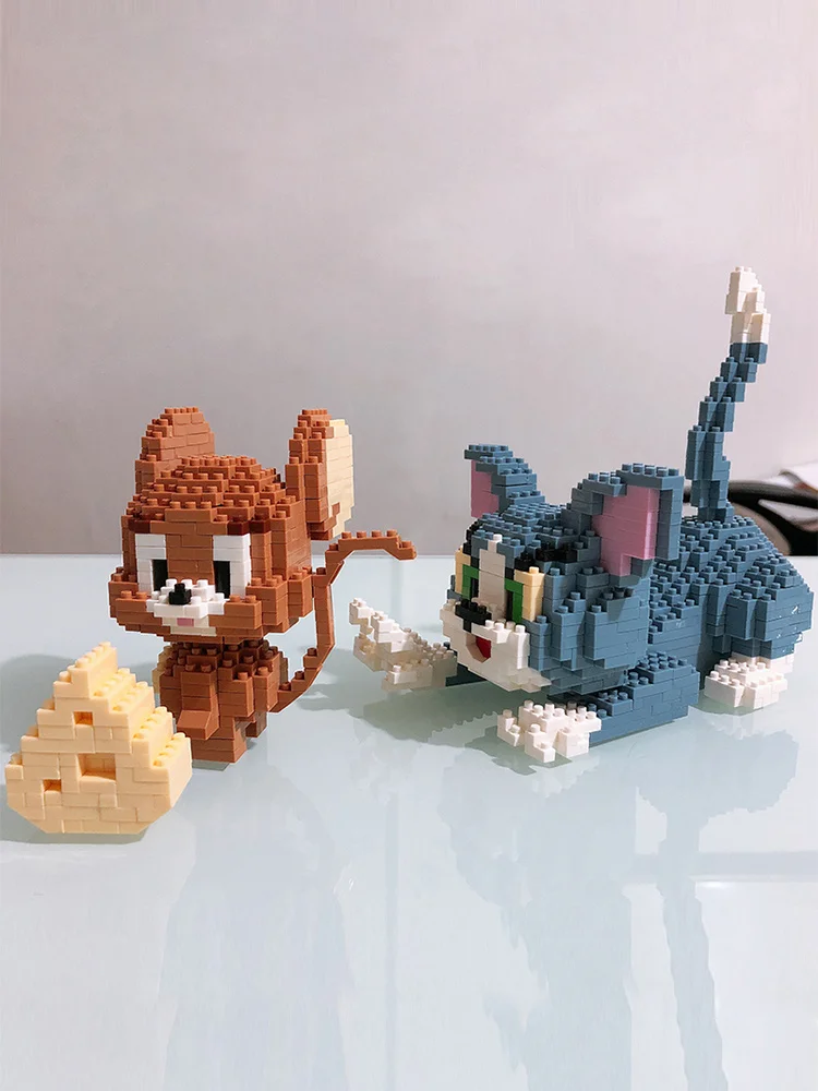 Mini assembly small particle puzzle building block toys compatible with LEGO cat and mouse
Mini assembly small particle puzzle building block toys compatible with LEGO cat and mouse