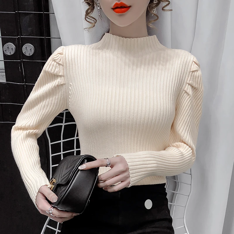 Женский трикотажный свитер-водолазка с длинным рукавом
Женский трикотажный свитер-водолазка с длинным рукавом