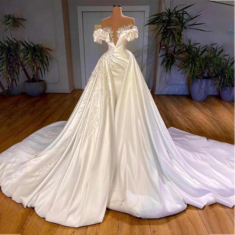 Luxury Overskirt Wedding Dresses with Detachable Train Satin Beaded Arabic Bridal Gowns Off the Shoulder Robe De Mariée
Luxury Overskirt Wedding Dresses with Detachable Train Satin Beaded Arabic Bridal Gowns Off the Shoulder Robe De Mariée