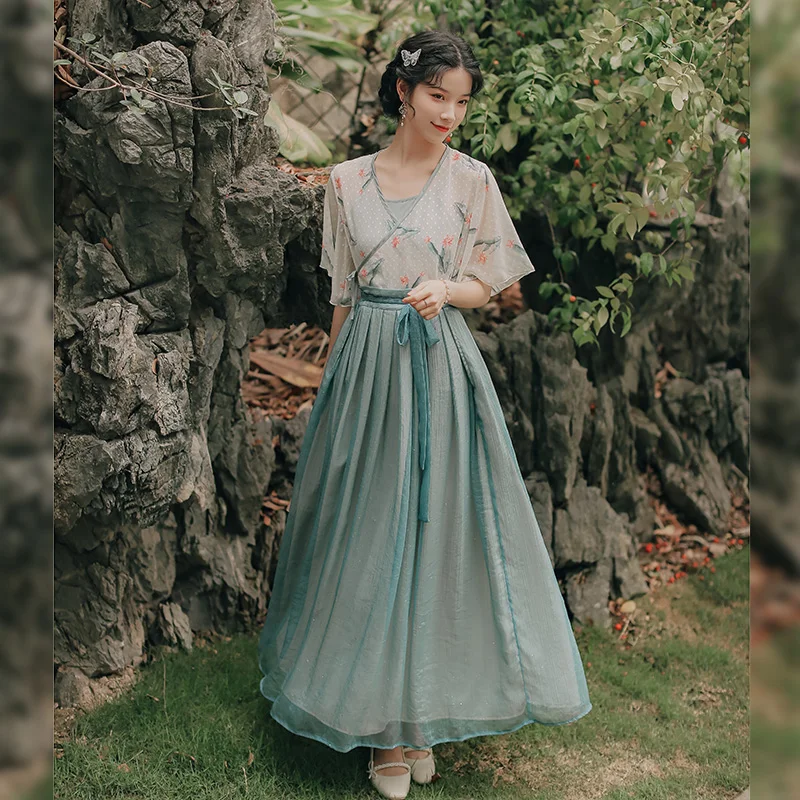 Women Sweet Retro Vestidos Summer Improved Hanfu Ladies Chiffon Printed V-neck Blouse and Brocade Silk Wrinkled Slim Skirt Set
Women Sweet Retro Vestidos Summer Improved Hanfu Ladies Chiffon Printed V-neck Blouse and Brocade Silk Wrinkled Slim Skirt Set