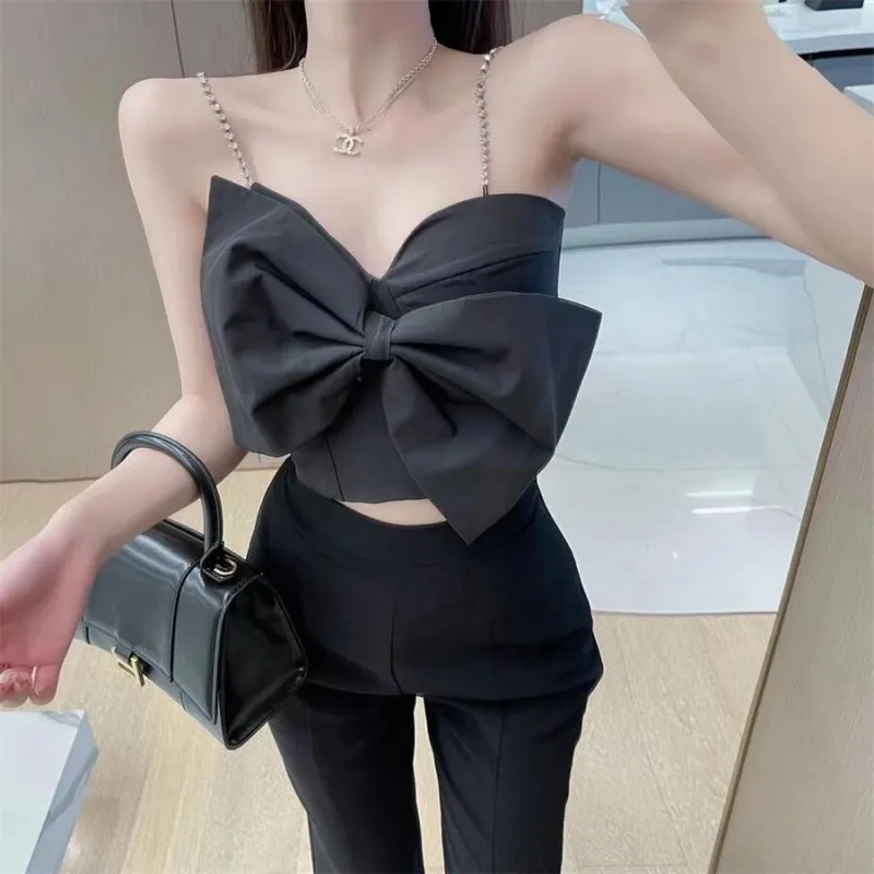 2021 summer fashion sexy women Oversized bow diamond sling tops + split flared trousers suit
2021 summer fashion sexy women Oversized bow diamond sling tops + split flared trousers suit