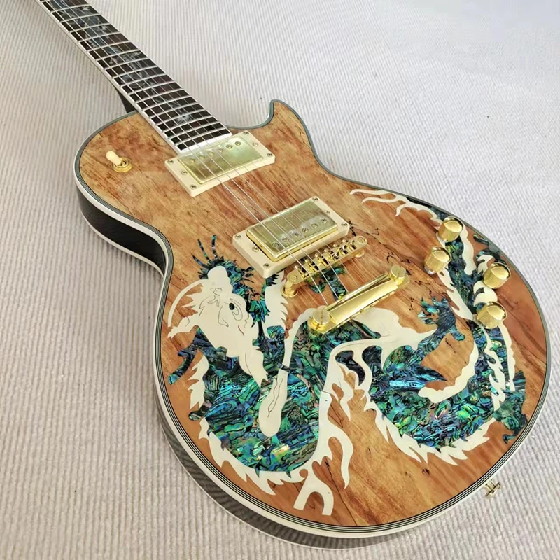 Luxury LP electric guitar, color shell inlaid fingerboard, inlaid piano body, good timbre and feel, free delivery to home.
Luxury LP electric guitar, color shell inlaid fingerboard, inlaid piano body, good timbre and feel, free delivery to home.