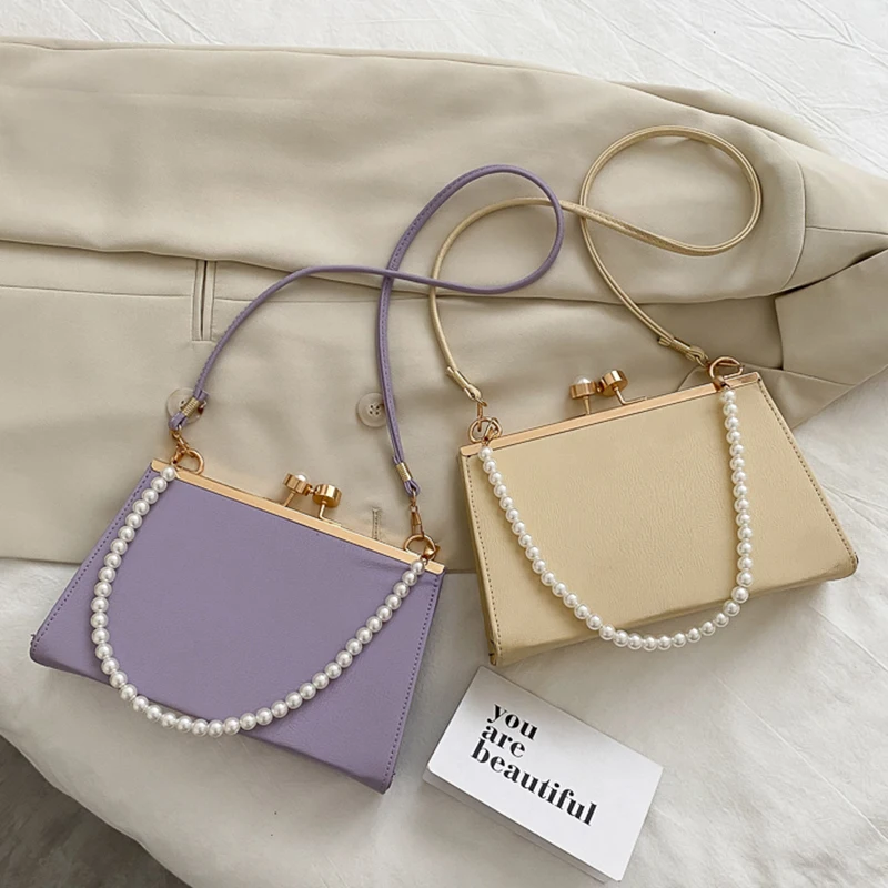 Casual PU Leather Clip Women's Shoulder Bags Fashion Pearl Handle Ladies Evening Clutch Purse Simple Solid Color Handbags Bolsos 
Casual PU Leather Clip Women's Shoulder Bags Fashion Pearl Handle Ladies Evening Clutch Purse Simple Solid Color Handbags Bolsos
