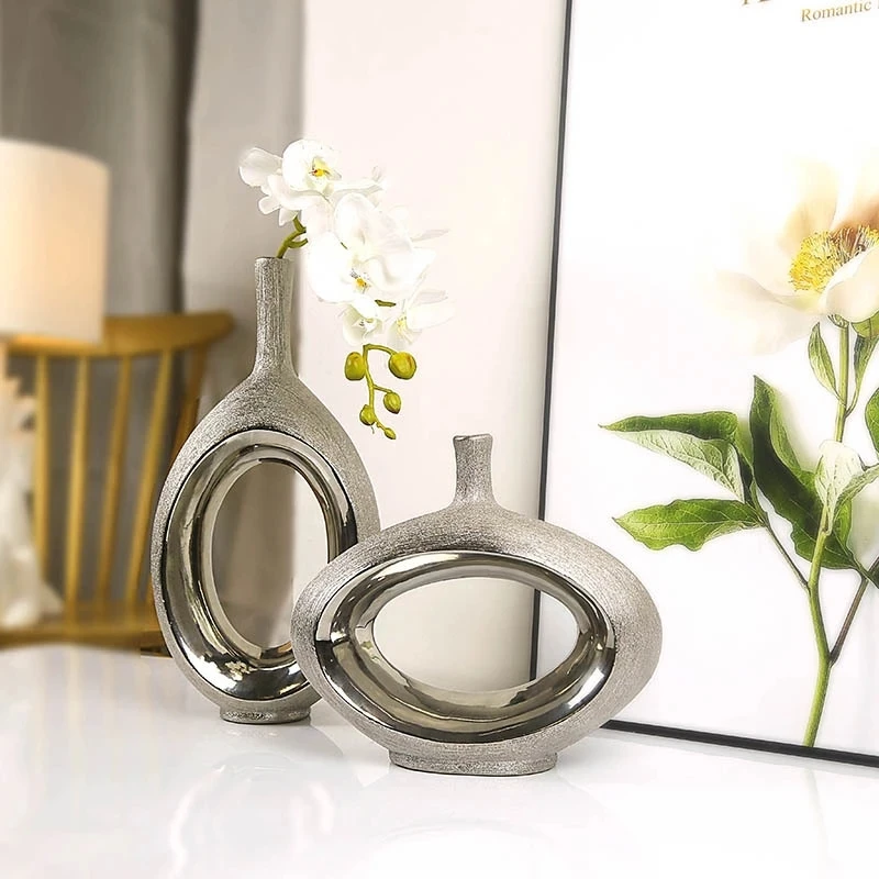 Silver Hollow Creative Ceramic Vase Simple Study Dining Table Decoration Modern Home Decoration Decoration
Silver Hollow Creative Ceramic Vase Simple Study Dining Table Decoration Modern Home Decoration Decoration