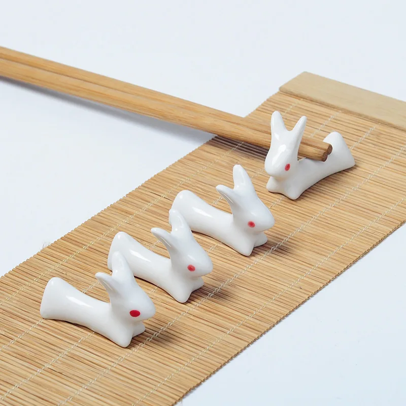 Japanese Cute Rabbit Chopstick Holder Creative Household Tableware Ceramic Chopstick Pillow Spoon Holder Kitchen Gadgets
Japanese Cute Rabbit Chopstick Holder Creative Household Tableware Ceramic Chopstick Pillow Spoon Holder Kitchen Gadgets