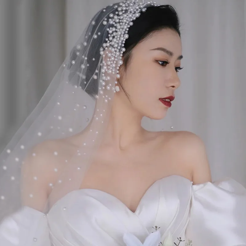 Pearl mid-length bridal veil, fashionable atmosphere, super fairy veil, wedding photo studio accessories
Pearl mid-length bridal veil, fashionable atmosphere, super fairy veil, wedding photo studio accessories