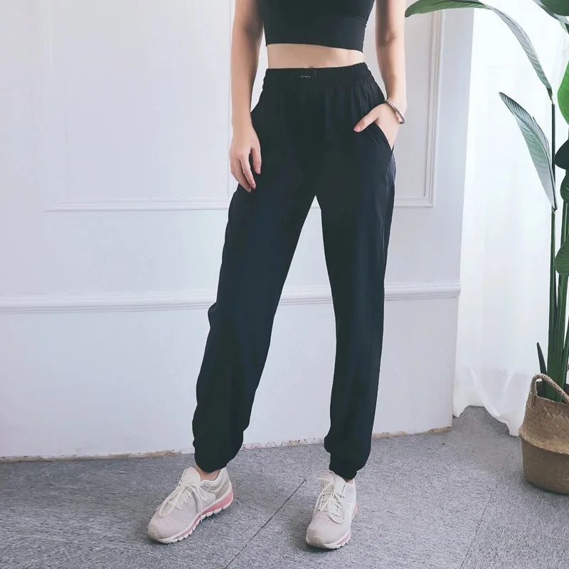 Women's Sports Pants Loose Breathable Drawstring Pocket Solid Running Fitness Sweatpants Hip Stitching Yoga Trousers Trucksuit
Women's Sports Pants Loose Breathable Drawstring Pocket Solid Running Fitness Sweatpants Hip Stitching Yoga Trousers Trucksuit