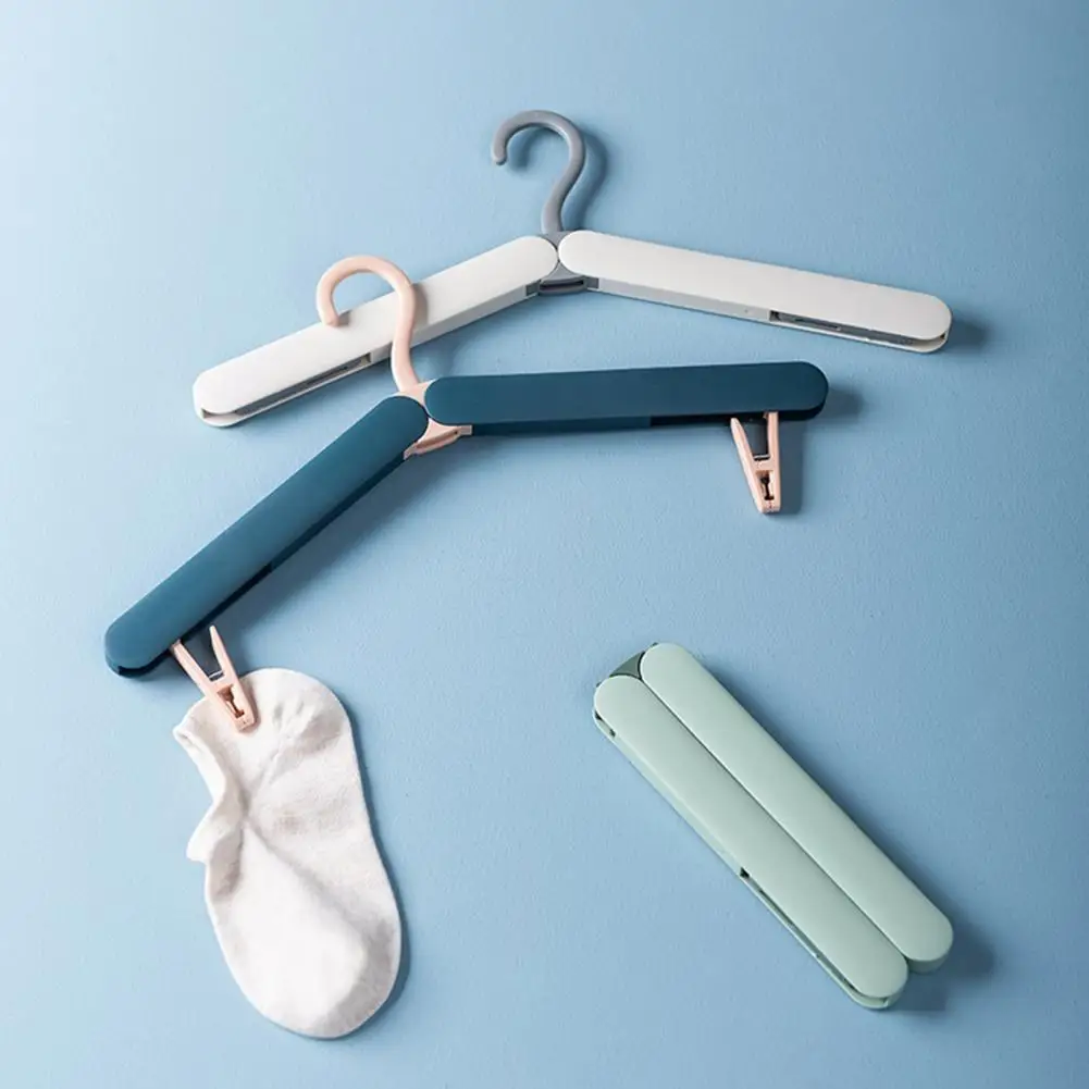 Durable Clothes Hanger Portable Lightweight Foldable Travel Folding Hanger Hook with Clip for Household Clothing Storage
Durable Clothes Hanger Portable Lightweight Foldable Travel Folding Hanger Hook with Clip for Household Clothing Storage