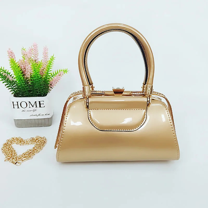 2021 Metal wrist fashion handbag for women gold evening bag PU leather shoulder bag
2021 Metal wrist fashion handbag for women gold evening bag PU leather shoulder bag