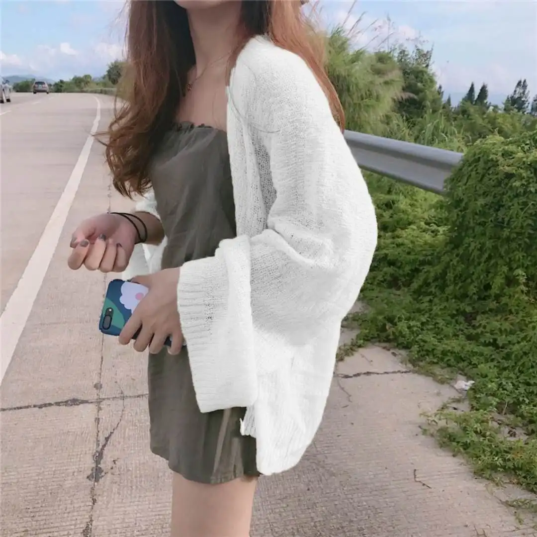Spring new medium and long knitted cardigan sunscreen clothes women's lazy Korean hollow out foreign style loose jacket
Spring new medium and long knitted cardigan sunscreen clothes women's lazy Korean hollow out foreign style loose jacket