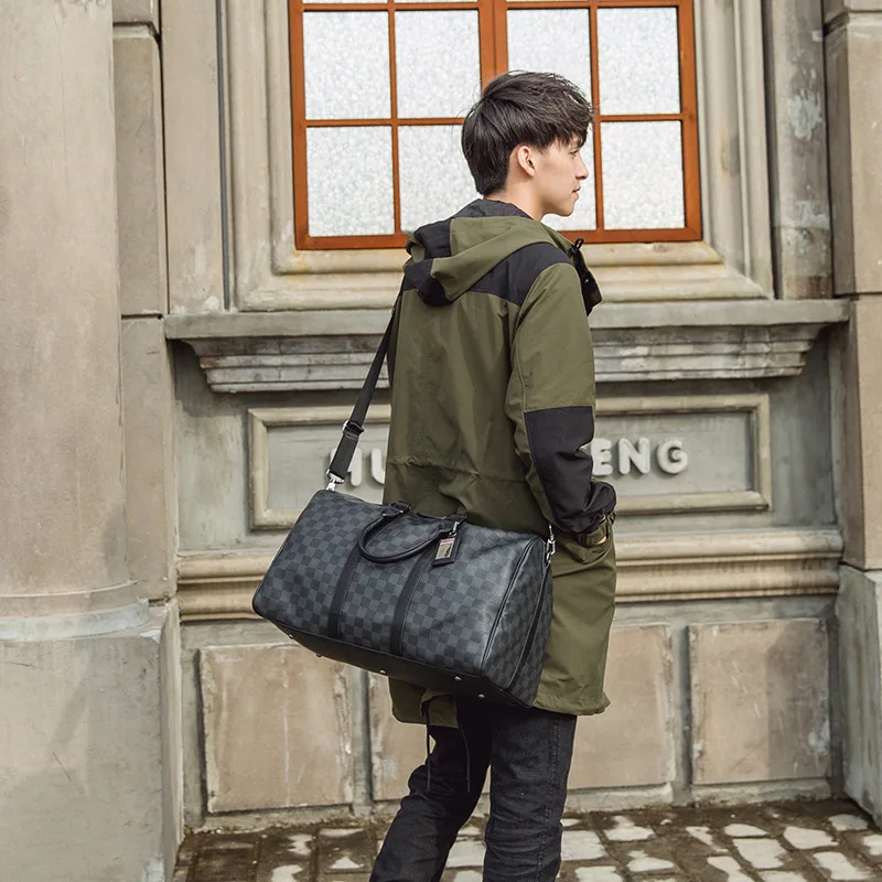 Ms fashion bag male classic bag PU leather large capacity travel bag shoulder bag black grid bag man sell like hot cakes
Ms fashion bag male classic bag PU leather large capacity travel bag shoulder bag black grid bag man sell like hot cakes