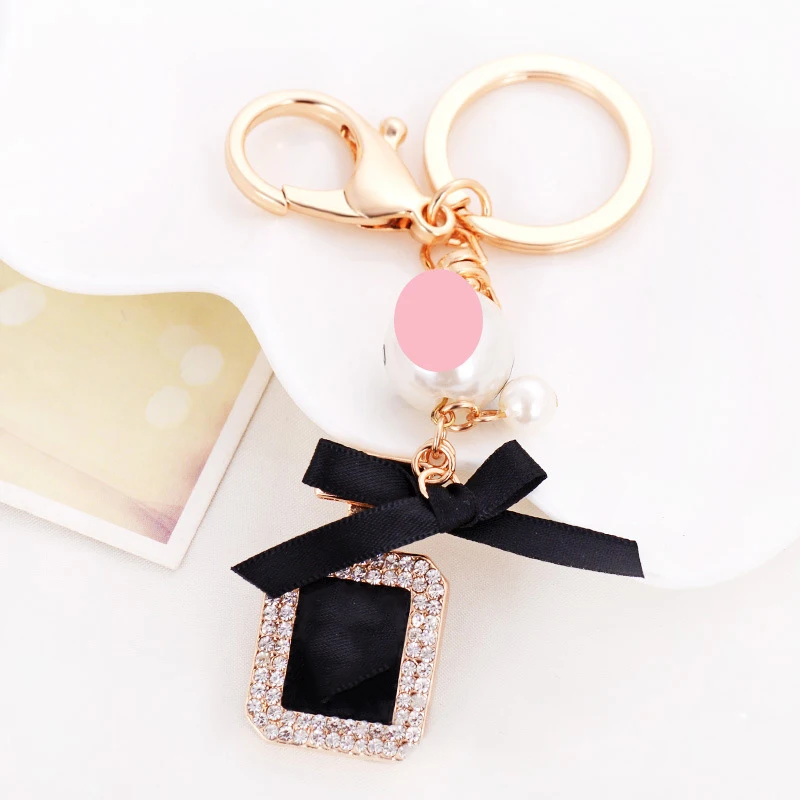 

Imitation Pearl Perfume Bottle Bow Keychain Car Ring Holder Bag Pendant Accessories Key Fob Girl Woman Birthday Present Keyring