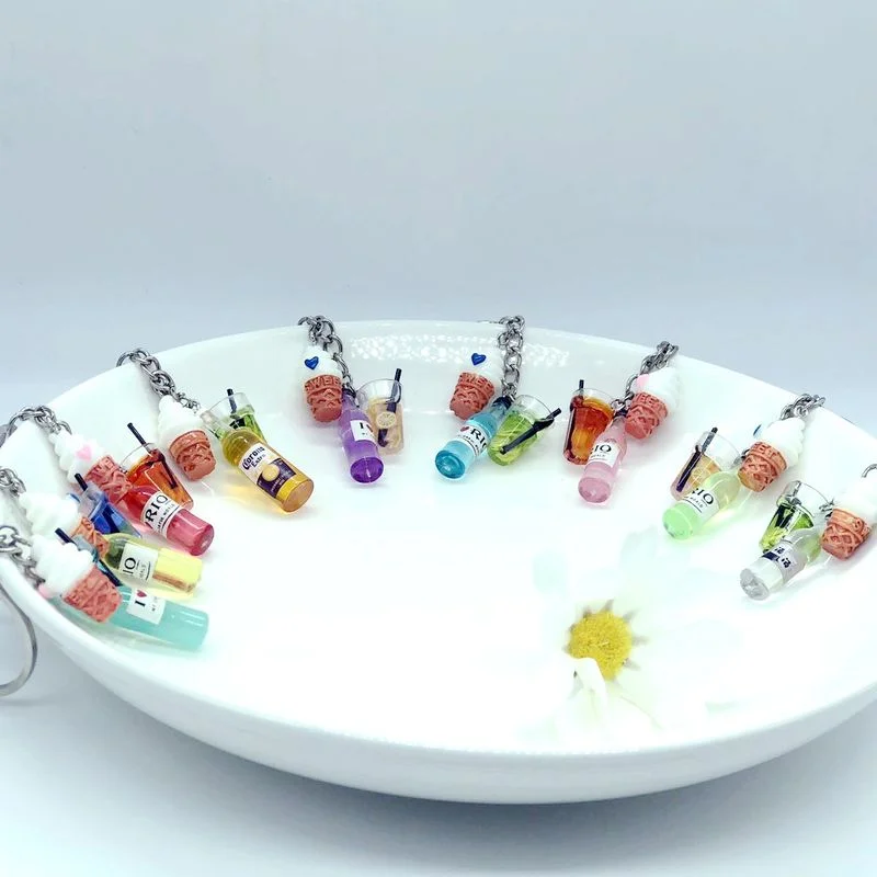 Simulation keychain cute colorful cocktail ice cream lemon tea keychain baby couple gift handmade jewelry
Simulation keychain cute colorful cocktail ice cream lemon tea keychain baby couple gift handmade jewelry