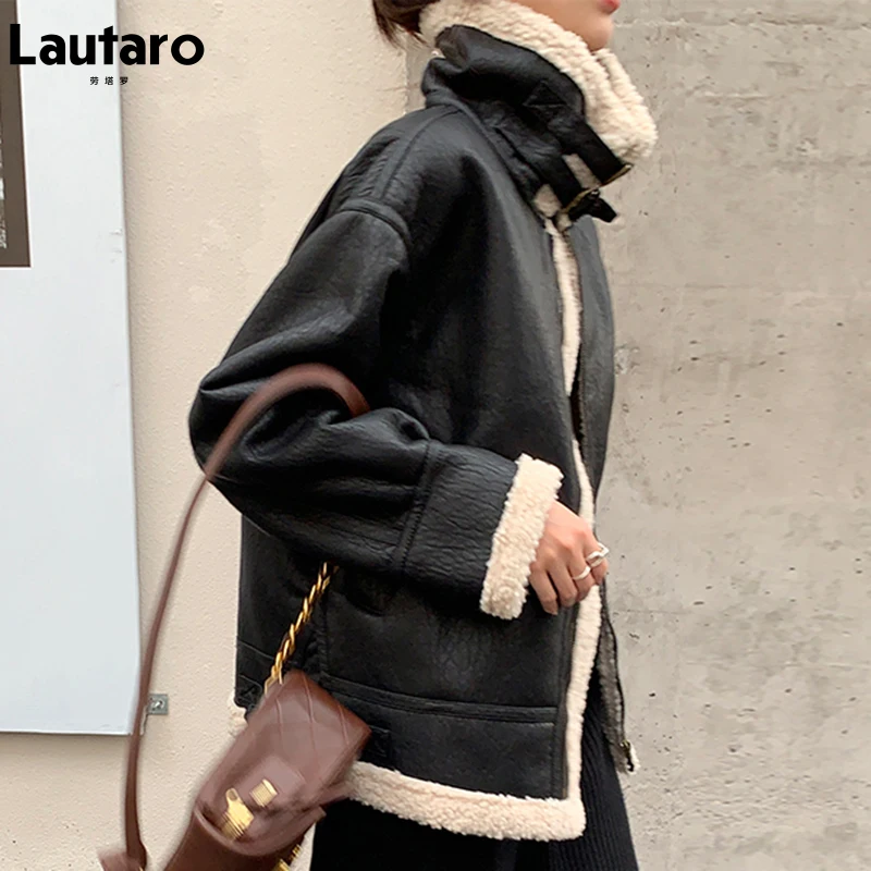 Lautaro Зимняя толстая теплая куртка из искусственной кожи для женщин с мехом ягненка на молнии с длинным рукавом Дубленка из искусственной ко... 
Lautaro Зимняя толстая теплая куртка из искусственной кожи для женщин с мехом ягненка на молнии с длинным рукавом Дубленка из искусственной ко...