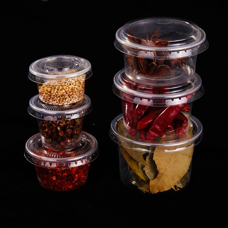 100Pcs Disposable Plastic Cup With Lid Takeaway Sauce Cup Containers Cake Jelly Yogurt Condiment Food Box Wedding Party Supplies
100Pcs Disposable Plastic Cup With Lid Takeaway Sauce Cup Containers Cake Jelly Yogurt Condiment Food Box Wedding Party Supplies