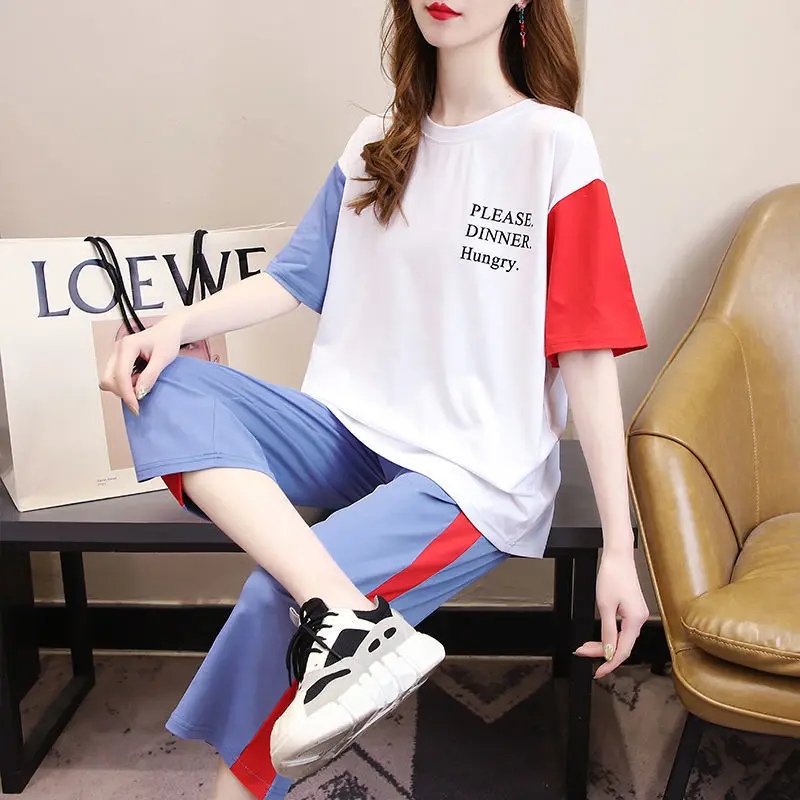 2021 Summer New Sports Suit Female Korean Loose Color Matching Sportwear Running Short-sleeved Cropped Trousers Two-piece Sets
2021 Summer New Sports Suit Female Korean Loose Color Matching Sportwear Running Short-sleeved Cropped Trousers Two-piece Sets