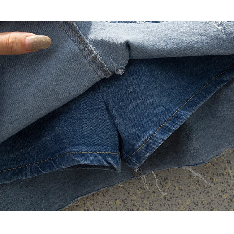 Nkandby Plus Size Denim Distressed Skirt Shorts Women 2021 Summer A-line Vintage High Waist Irregular Ripped Skirts Female
Nkandby Plus Size Denim Distressed Skirt Shorts Women 2021 Summer A-line Vintage High Waist Irregular Ripped Skirts Female