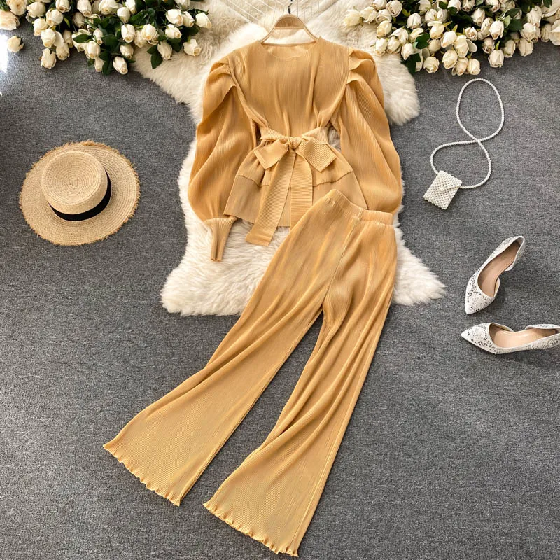 Spring And Autumn New Chiffon Puff Long Sleeve Round Neck Tops With Belt + Wide Leg Pants Knitted Women Casual Two-Piece Set
Spring And Autumn New Chiffon Puff Long Sleeve Round Neck Tops With Belt + Wide Leg Pants Knitted Women Casual Two-Piece Set