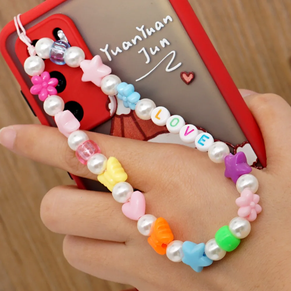 Sweet Pearl Phone Chain 2021 Boho Aesthetic Cute Star Accessories Color Letter Women Jewelry Hand Made Rope for Mobile Gift
Sweet Pearl Phone Chain 2021 Boho Aesthetic Cute Star Accessories Color Letter Women Jewelry Hand Made Rope for Mobile Gift
