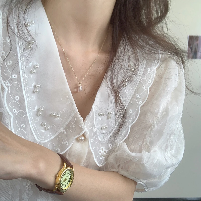2021 Pearl Decoration Elegant Blouse Women Turn Down Collar Short Sleeve Tops Single Breasted New Chic Shirts Blusas Mujer
2021 Pearl Decoration Elegant Blouse Women Turn Down Collar Short Sleeve Tops Single Breasted New Chic Shirts Blusas Mujer