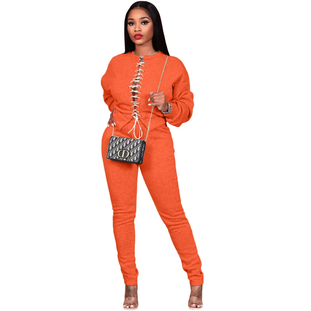 

Woman's Tracksuit Activewear Sporty Suit Lace Up Hollow Out Long Sleeve Pullover and Stacked Sweatpant Jogger Pant Hoodie Outfit