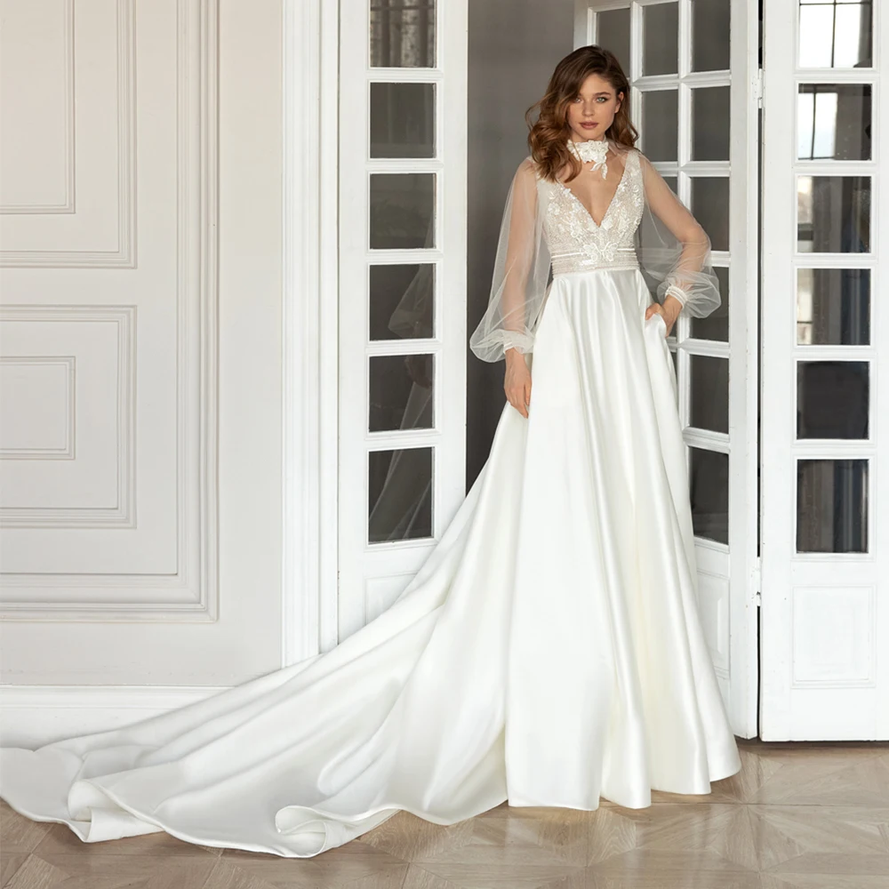 Exquisite Deep V-Neck Full Sleeve Wedding Dresses with Applique A-Line Floor-Length Jersey Zipper Back Brush Train Bridal Gowns
Exquisite Deep V-Neck Full Sleeve Wedding Dresses with Applique A-Line Floor-Length Jersey Zipper Back Brush Train Bridal Gowns
