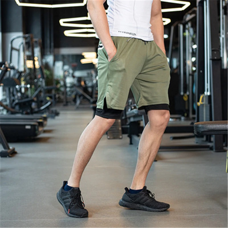 New men's two-in-one running shorts jogging training quick-drying beach shorts men's summer sports and leisure exercise pants
New men's two-in-one running shorts jogging training quick-drying beach shorts men's summer sports and leisure exercise pants