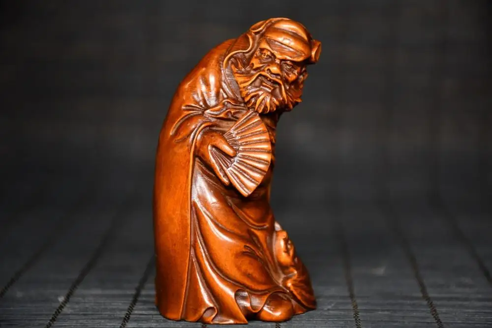 3" China Collection Old Boxwood Zhong Kui Buddha Statue Engraving Woodcarving of Folding Fan by Zhong Kui Ward off evil spirits
3" China Collection Old Boxwood Zhong Kui Buddha Statue Engraving Woodcarving of Folding Fan by Zhong Kui Ward off evil spirits