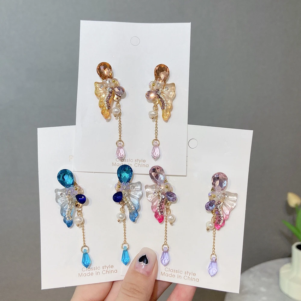 MENGJIQIAO Korean Sweet Colorful Crystal Wings Drop Earrings For Women Ladies Fashion Hanging Tassel Boucle D'oreille Jewelry
MENGJIQIAO Korean Sweet Colorful Crystal Wings Drop Earrings For Women Ladies Fashion Hanging Tassel Boucle D'oreille Jewelry