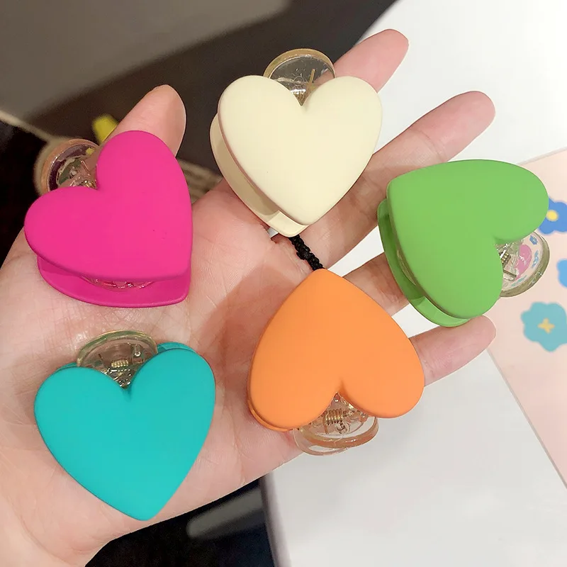 Korean Style Candy Color Frosted Heart-shaped Catch Clip Cute Girl Simple Hair Accessories Headdress Broken Hair Bangs Clip
Korean Style Candy Color Frosted Heart-shaped Catch Clip Cute Girl Simple Hair Accessories Headdress Broken Hair Bangs Clip