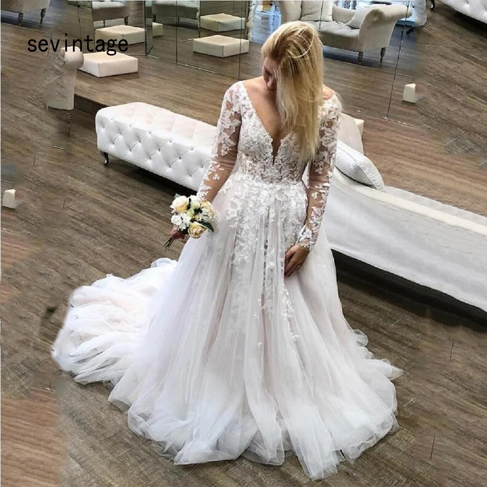 Sevintage Elegant Long Sleeve Wedding Dresses Deep V Neck Appliques Lace Country Garden Bride Party Dress Backless Bridal Gowns
Sevintage Elegant Long Sleeve Wedding Dresses Deep V Neck Appliques Lace Country Garden Bride Party Dress Backless Bridal Gowns
