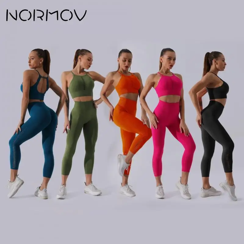NORMOV Yoga Sets Women Gym Clothes Hollow Out Workout Set Fitness Leggings and Sport Bra Women's Fitness Suit 
NORMOV Yoga Sets Women Gym Clothes Hollow Out Workout Set Fitness Leggings and Sport Bra Women's Fitness Suit