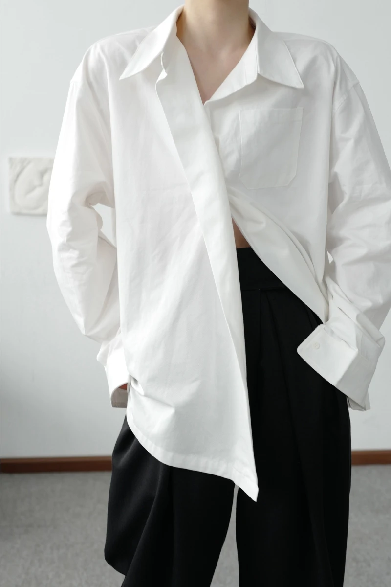 SuperAen 2021 New Design Oversize Turn Down Collar Loose White Shirt Solid Simple Asymmetrical Women Tops
SuperAen 2021 New Design Oversize Turn Down Collar Loose White Shirt Solid Simple Asymmetrical Women Tops