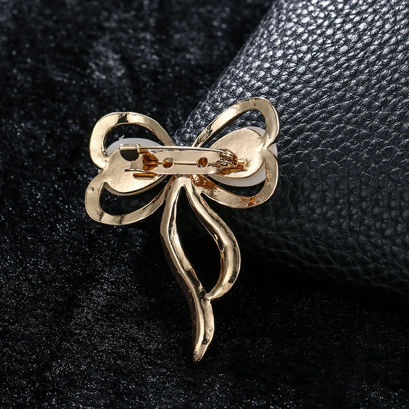baiduqiandu Brand New Arrival Simulated Pearl Bow Alloy Metal Brooch Pins for Women 
baiduqiandu Brand New Arrival Simulated Pearl Bow Alloy Metal Brooch Pins for Women