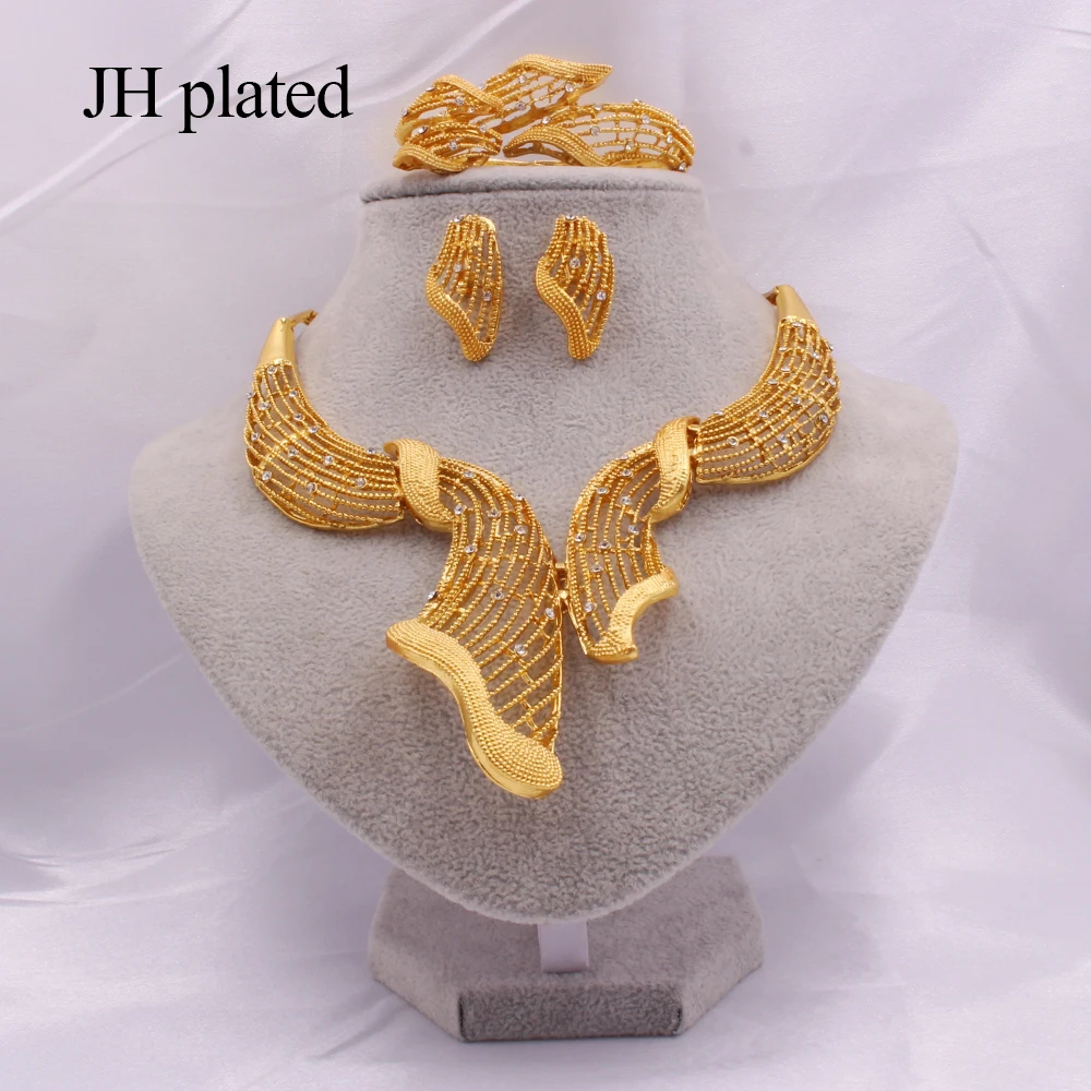 Jewelry sets Dubai gold color African bridal wedding party gifts for women Nigeria Necklace Bracelet Earrings ring set jewellery
Jewelry sets Dubai gold color African bridal wedding party gifts for women Nigeria Necklace Bracelet Earrings ring set jewellery