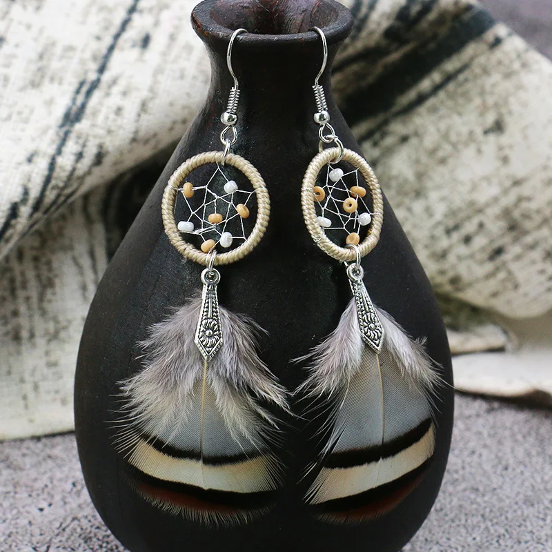 New Fashion Popular Dreamcatcher Earrings Female Personality Feather Pendant Earrings Bohemian Simple Jewelry Wholesale
New Fashion Popular Dreamcatcher Earrings Female Personality Feather Pendant Earrings Bohemian Simple Jewelry Wholesale